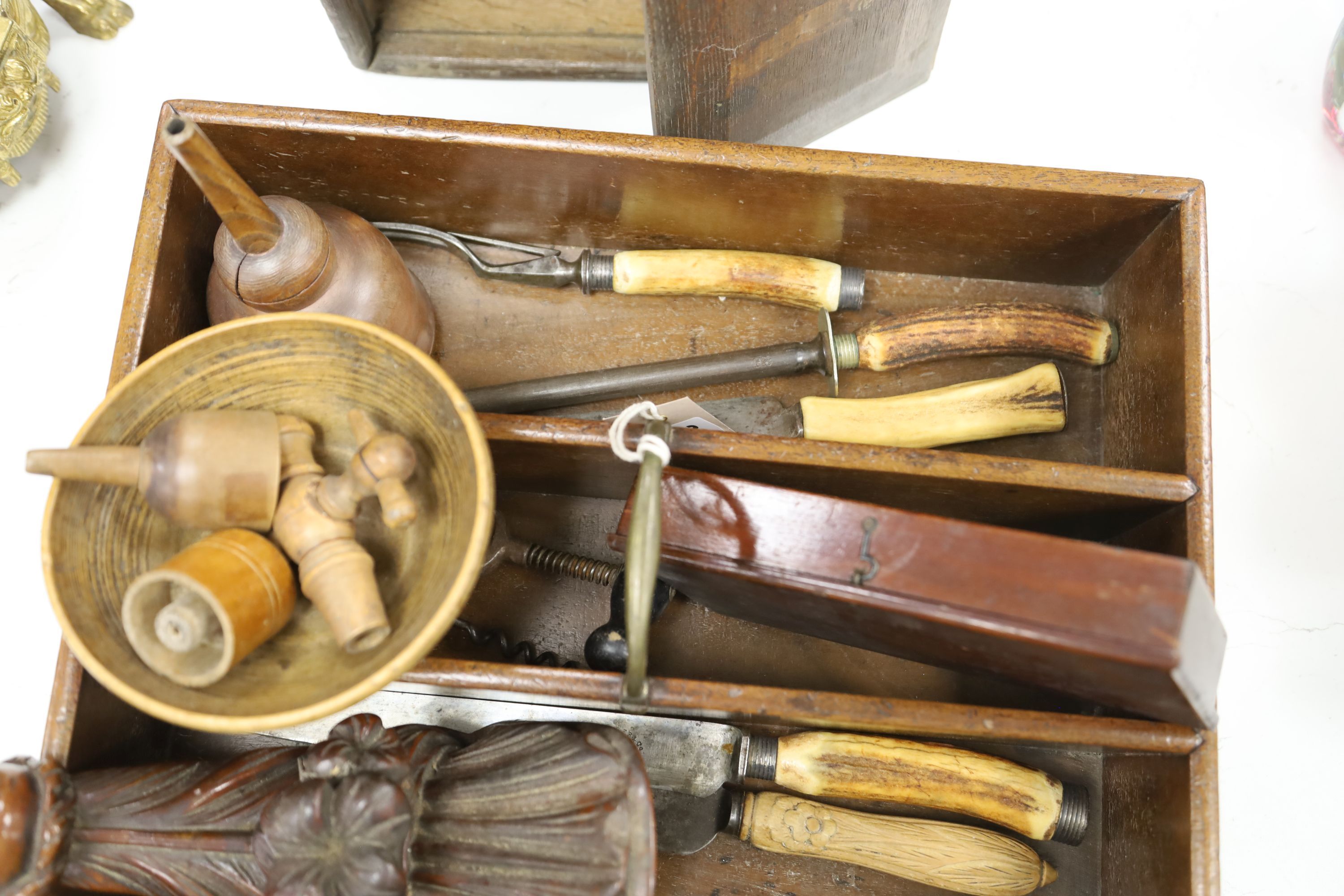 A 19th century oak candle box, a corbel, cutlery tray and sundry treen items